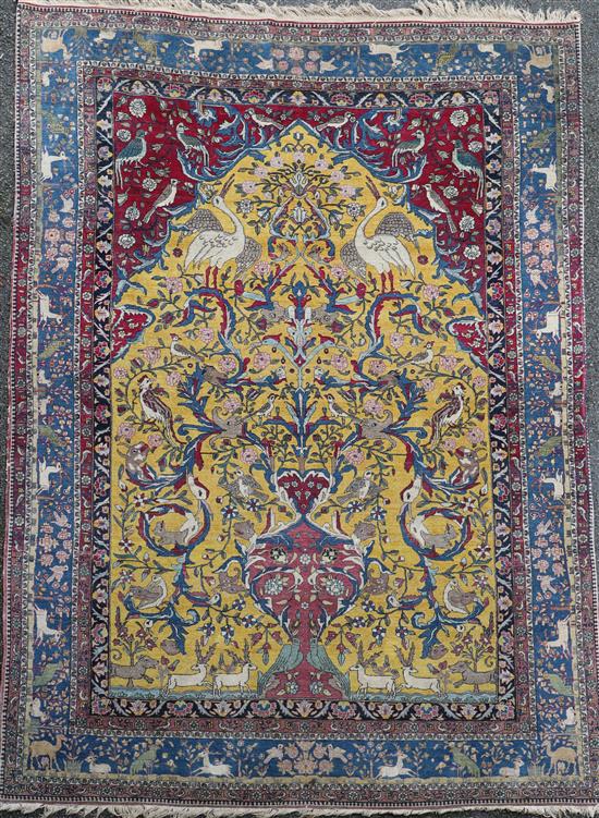 An antique North West Persian Tree of Life yellow ground carpet, 10ft by 6ft 11in.